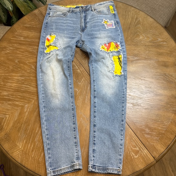 Born Fly Jeans with patchwork graphics - Picture 1 of 8